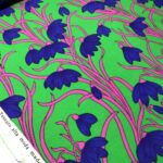 Tissu jersey viscose Fleurs bleu - Fond vert, rose