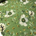 Tissu jersey viscose Fleurs - fond vert