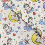 Tissu coton imprimé Bio Certifié GOTS Licorne - Multicolore, fond blanc