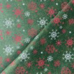 Tissu Feutrine flocons - Rouge, blanc, fond vert