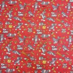 Tissu coton imprimé Certifié Oeko-tex Tom & Jerry - Fond rouge