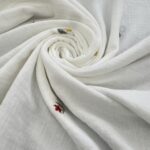 Tissu double gaze brodée - Fleurs, fond blanc