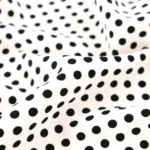Tissu Crêpe à Pois Noir - Fond blanc